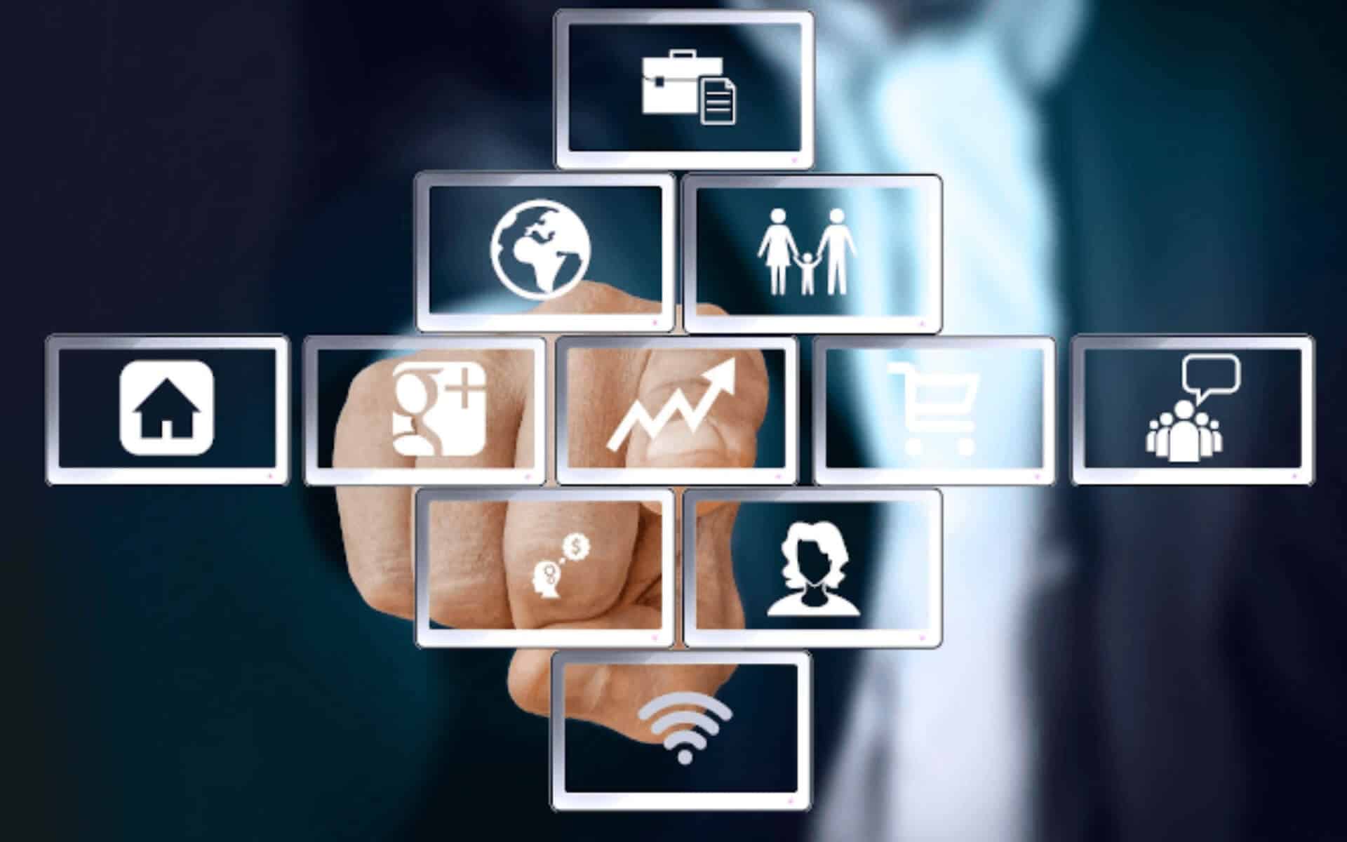 A man taps a virtual button on a dashboard touchscreen from behind (metaphor for automation)